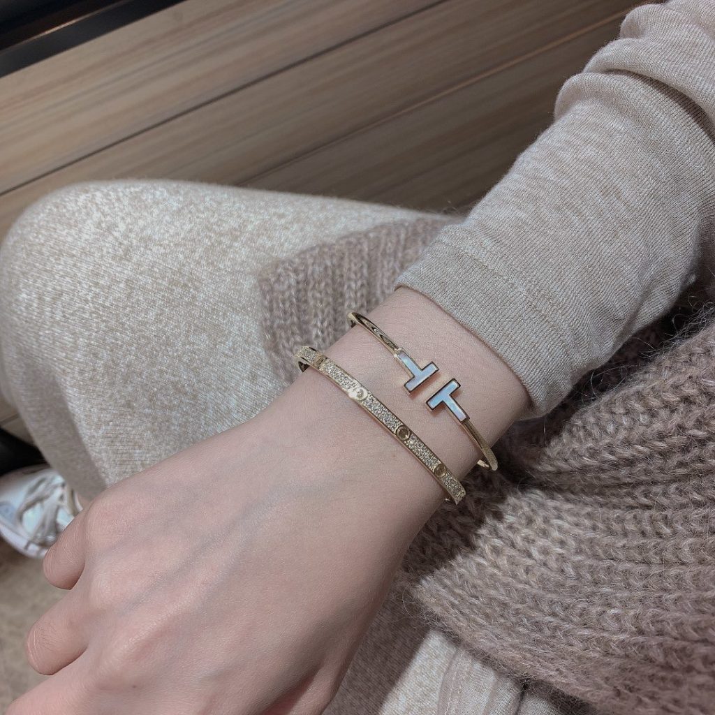 Tiffany T bracelet and Cartier love bracelet diamonds