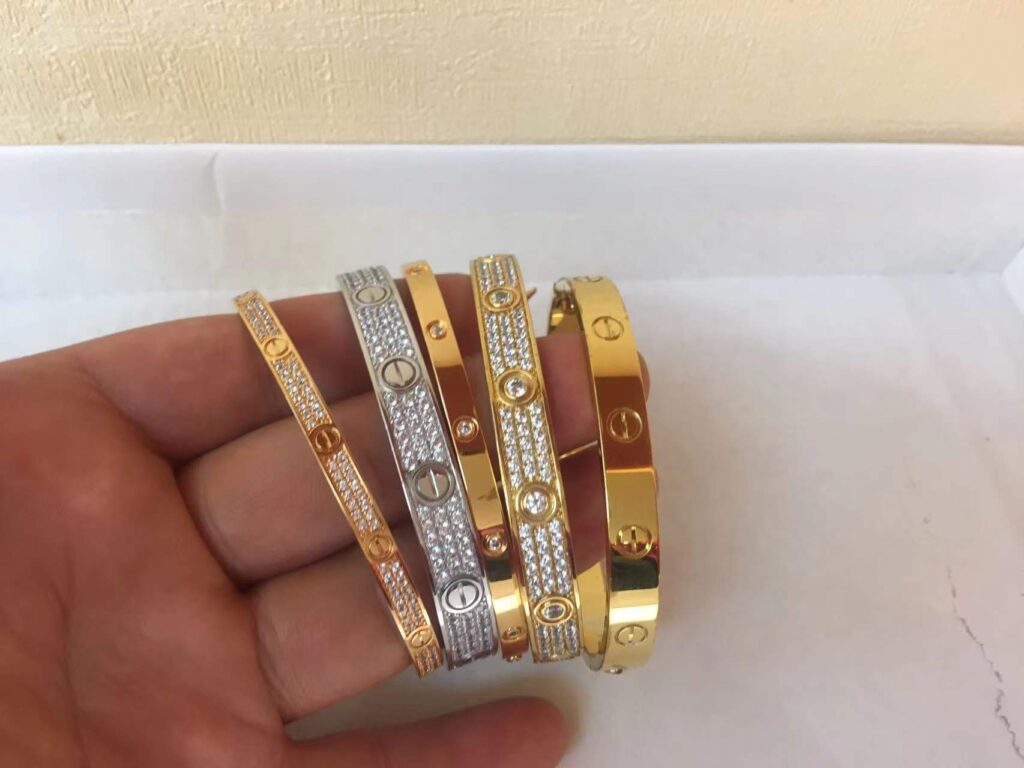 Cartier LOVE bracelet Small/thin and Thick/classic in yellow gold, white gold and rose gold pave diamonds