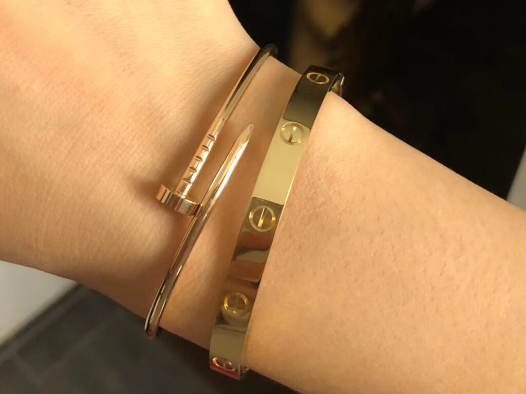 The stacking effect of Cartier love bracelet and Cartier Juste Un Clou Bracelet