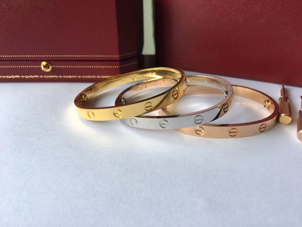 Cartier Love Bracelet in yellow gold, rose gold and white gold